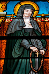 Fototapeta premium Stained glass (19th century) of St. Jane Frances de Chantal or Sainte Jeanne de Chantal. Founder of the Order of the Visitation of Holy Mary.