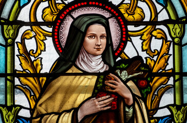 Stained glass (1930) of St. Therese of Lisieux or Therese de Lisieux, Carmelite nun and Saint of...