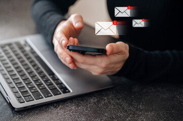 A woman interacting with a digital email notification, symbolizing an email campaign alert