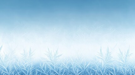 Obraz premium Winter's embrace, frosty grass and blue sky create a serene landscape icy