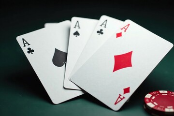 Four aces fanned out, showcasing the card details and pattern , macro, spread