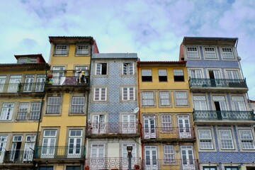 The row of colorful buildings in Porto illustrates the rich architectural heritage of the city