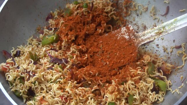 Boil water, add Maggi noodles and seasoning, cook for 2 minutes, stir well, and enjoy a quick, tasty meal.