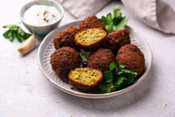 Middle Eastern falafel balls with sauce