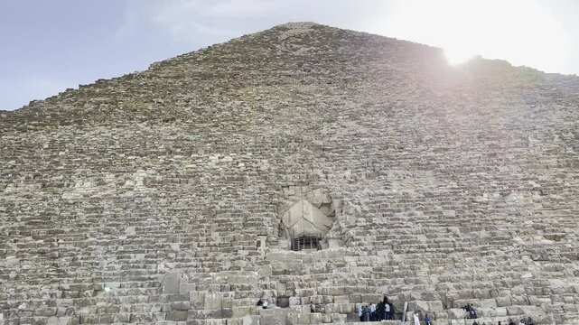 Explore the Great Pyramid of Giza, Egypt, a modern world wonder, and venture into its ancient depths. Discover the mysteries hidden within its iconic structure.