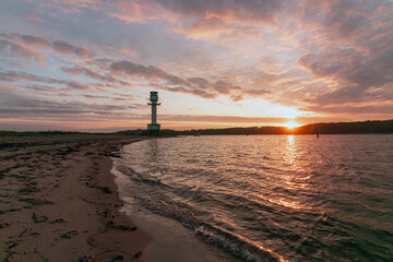 Fototapeta premium View to Falckenstein beach with lighthouse at sunrise.