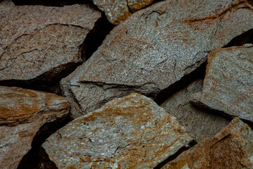 Rock wall. Background of stone for decoration. texture for design. Granite pebbles texture