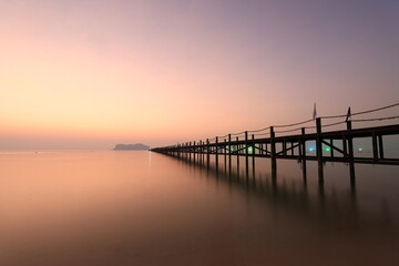 Fototapeta premium Sunrise view in the morning at Ban Hin Kop fishing village, near the pier to Koh Tao, Chumphon Province : Thailand. 