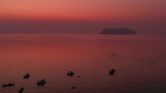 Sunrise view in the morning at Ban Hin Kop fishing village, near the pier to Koh Tao, Chumphon Province : Thailand.
