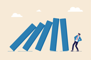 Risk management, uncertainty or unknown threat causing business failure, economic crisis, danger or problem, security and safety concept, courage businessman thinking look at collapsing domino effect.