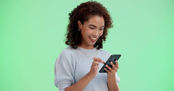 Woman, happy and phone scroll by green screen for social media, networking and communication. Girl, mobile and laugh for comedy post, online comic strip and reading silly story by studio background