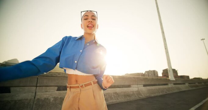 Selfie, dance and frame with woman in city for social media, trend setter and streaming. Profile picture, influencer and gen z with portrait of person for subscription, viral and photography