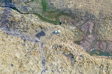 DRONE VIEW OF RIVER SOURCES IN THE HIGH ANDEAN MOUNTAINS
