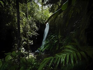 Tropical Waterfall in Dense Forest: A Picturesque Landscape for Nature Lovers Seeking Relaxation and Eco-Tourism Adventures