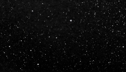 a transparent black distressed overlay background with tiny white particles scattered across it creating an impression of stars or snowflakes in the night sky