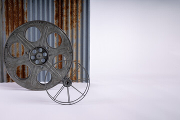 Vintage Film Reels against corrugated metal