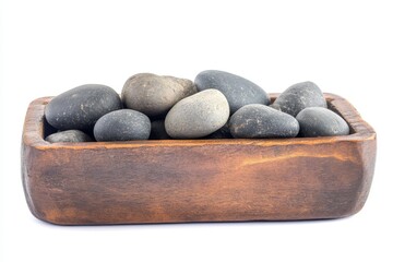 Natural decor and minimalism are embodied by a rustic wooden box filled with decorative stones, isolated against a blank background