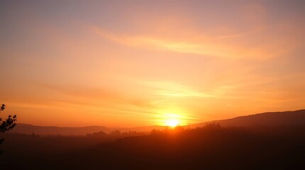 Golden Sunrise over Misty Hills