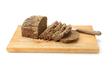 Dark bread with seeds on a bread cutting board isolated on white