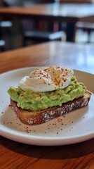 Avocado Toast with Poached Egg: Gourmet Breakfast Dish and Healthy Food Trend
