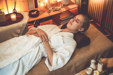 Caucasian woman customer enjoying relaxing anti-stress spa massage and pampering with beauty skin...