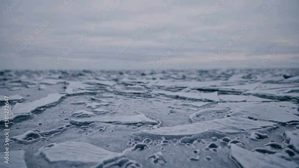 Poster close-up video of raindrops on a window, captured from a straight-on angle, creating a calming, abst