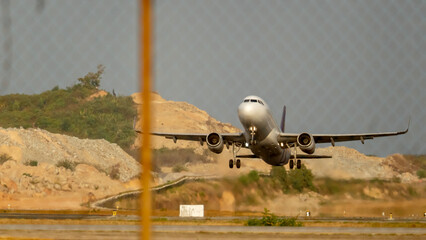Passenger plane in the sky on takeoff