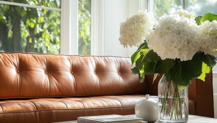 Cozy living room with a leather couch and hydrangea
