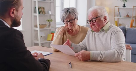 Senior old family couple clients consulting on health, financial insurance with agent lawyer, mature customers meeting bank manager, investment or medical contract, advising, offering expert advice