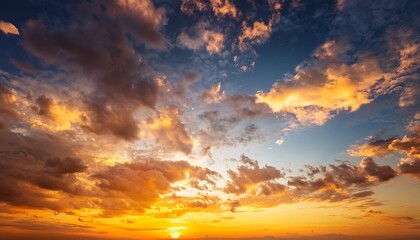 beautiful and dramatic sunset sky with bright yellow clouds as abstract background