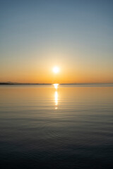 Fototapeta premium view of sunset over lake constance / Bodensee seen from Bregenz with negative space for text