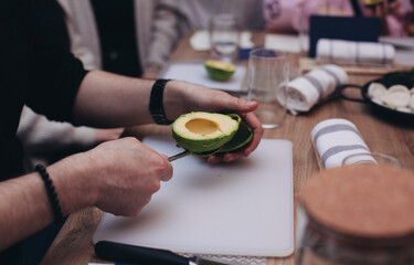 the process of making avocado for sushi