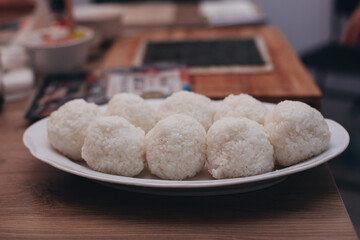 the process of preparing rice for japanese rolls