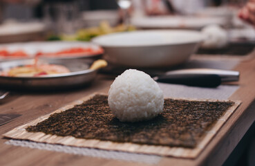 the process of preparing rice for japanese rolls