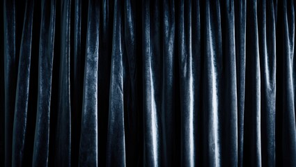 Fototapeta premium Textured background of dark grey curtain featuring numerous folds.