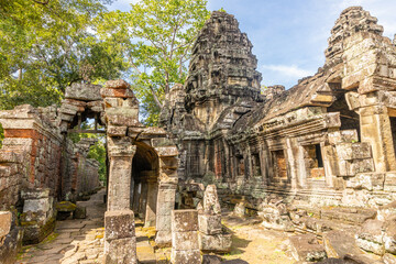 Naklejka premium Forgotten in jungles ancient remains of hindu legendary Banteay Kdei khmer ruined temple, Angkor Archaeological Park, Siem Reap, Cambodia