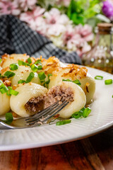 Potato dumplings with meat.