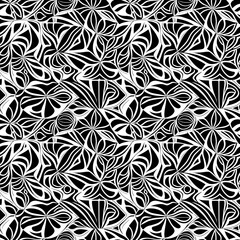 a black and white floral pattern on a black background