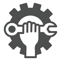 Hand with wrench at cogwheel solid icon, repair service concept. Vector graphics. Mechanician hand with spanner, repair sign on white background, glyph style icon for mobile or web design.