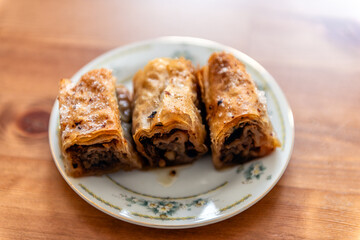Crnogorska pita dessert plate of Montenegro baklava sweet in Balkans from bakery in Podgorica with nuts and fruit filling