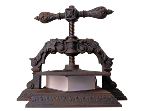 Old historic bookbinding press on an isolated background.