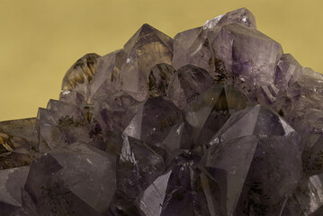 This captivating image features a vibrant amethyst crystal cluster, highlighted by its deep purple color and natural facets, perfect for collectors and enthusiasts of mineralogy
