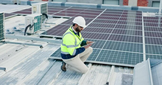 Engineering, man and tablet with solar panel on rooftop for renewable energy installation and quality assurance. Power supply service, technician and inspection of photovoltaic grid for maintenance