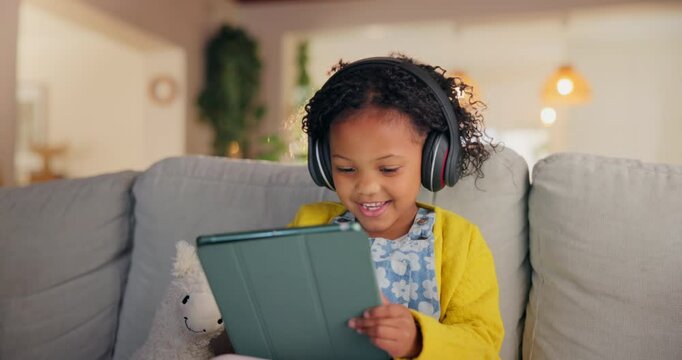 Girl, child and tablet for audio in home, online education and listening to podcast for learning. Female person, kid and playing games in living room for mind development, happy song and streaming