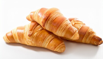 golden croissants on white background