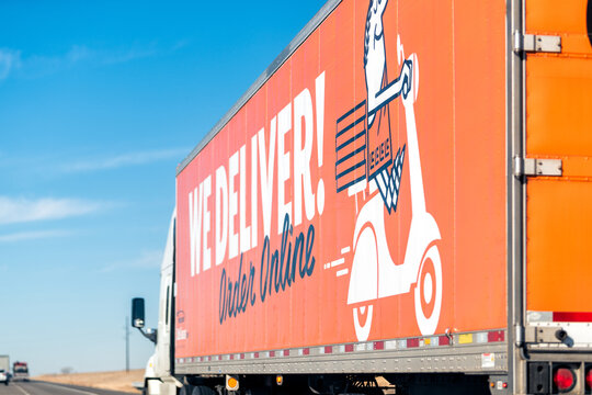 Ellsworth, USA - November 22, 2022: Kansas interstate i70 road cars and truck sign for Little Caesar's delivery driving car point of view