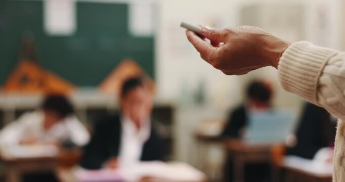 Students, teacher and hand with chalk in classroom for math lesson, problem solving and equation demonstration. Japanese academy, educator and education development with learning support and solution