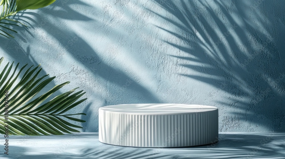 Poster A minimalist display stand rests against a soft blue wall, where shadows from lush palm leaves create a captivating interplay of light. The tranquil setting evokes a serene atmosphere