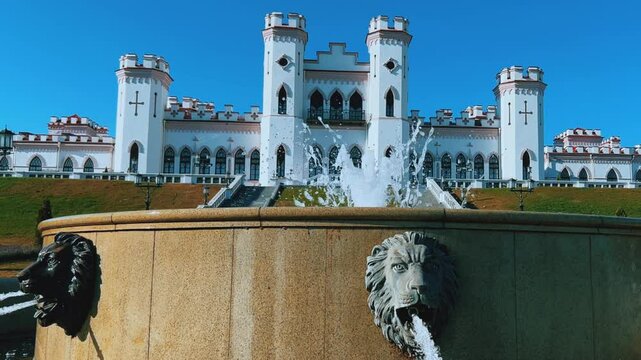 Belarus, Puslovsky Palace, September 5, 2024: Kossovsky Autumn Castle. An old historical castle in Kosovki in sunny autumn weather. An architectural monument in the style of English Neo-Gothic. 4K
