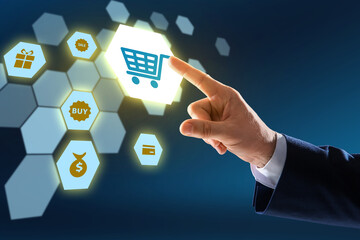 Online store. Man touching shopping cart icon among others on virtual screen against dark blue...